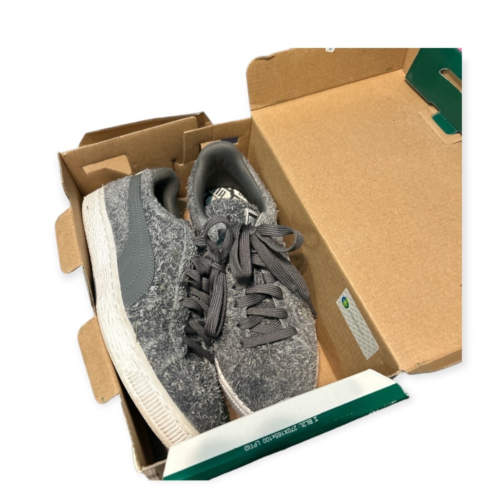Grey fuzzy puma sneakers